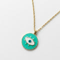 Collar con ojo verde