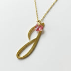 Inicial J con zirconia