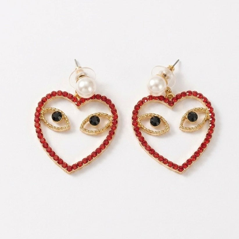 Aretes de corazón con ojos