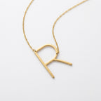 Collar con inicial R