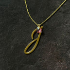 Inicial J con zirconia