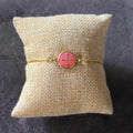 Brazalete con medalla